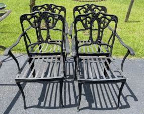 Four Cast Iron Outdoor Chairs