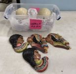 Two Ostrich Eggs and Four Peru Pottery Faces