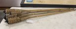 Four Used Cane Tiki Torches