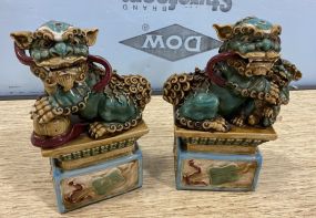 Pair of Chinese Pottery Foo Dogs