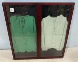 Pair of Shadow Box Framed Child's Clothes