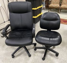 Two Black Vinyl Office Chairs