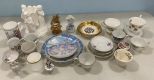 Assorted Porcelain Cups, Candle Holder, and Plates