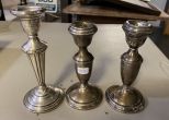 Three Weighted Sterling Candle Sticks