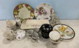 Collection of Porcelain Plates and Cups