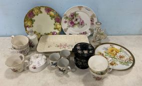 Collection of Porcelain Plates and Cups