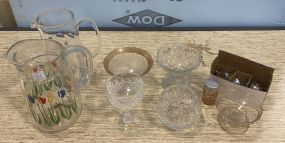 Group of Glassware Including 2 Water Pitchers, Set of Salt and Pepper Shakers, and Other Misc Items
