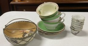 Cup and Saucers, Decorative Bowl, and Sauce Bowls