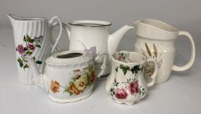 Five Assorted Styled Porcelain Pitchers