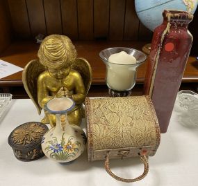 Angel, Candle, Pottery Jar, Vase, and Metal Purse