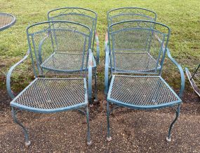 Four Wrought Iron Outdoor Chairs