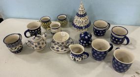 Group of Porcelain Cups, Milk and Sugar Bowls, Christmas Tree Candle Dome, and Other Misc Items