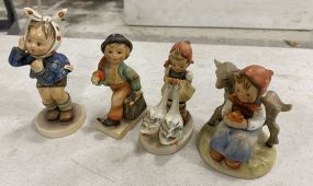 Four Collectible Hummel Figurines