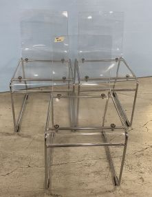 Three Clear Plastic Contemporary Side Chairs