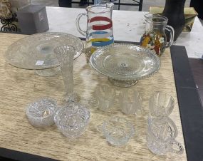 Group of Assorted Glassware, Cake Stands, 2 Pitchers, Set of Coasters, 3 Tea Cups, Bud Vase, and Other Misc Items