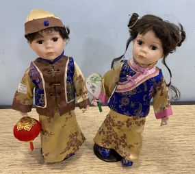 Two Porcelain Chinese Dolls