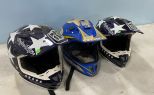 Three dirt Bike Helmets