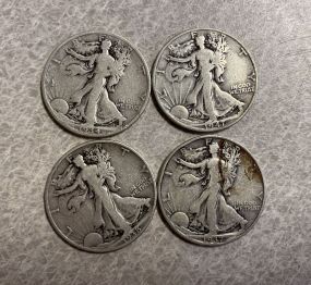 Four 1930's Walking Liberty Half Dollars