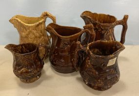 Five Vintage Glazed Stoneware Pitchers