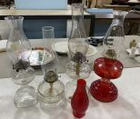 Four Glass Oil Lamps