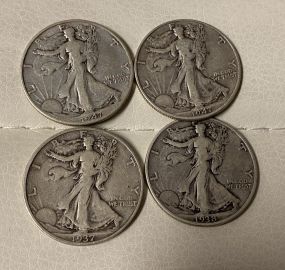 Four Silver Walking Liberty Half Dollars