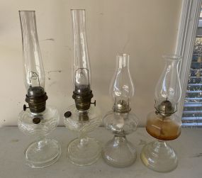 Four Glass Oil Lamps