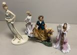 Four Collectible Woman Figurines
