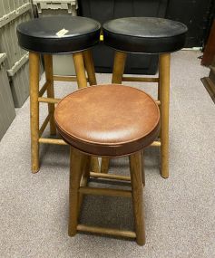 Three Vinyl Cushion Bar Stools