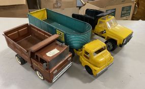 Three Metal Toy Trucks