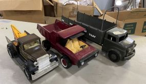 Three Metal Trucks