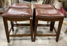 Four Brown Leather Cushion Bar Stools