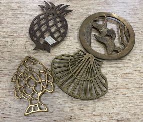 Four Brass Trivets