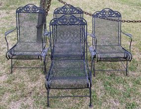 Four Wrought Iron Patio Arm Chairs