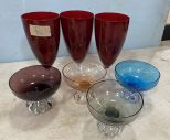 3 Red Glass Goblets and Four Multi Color Sherbets