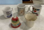 Group of Coffee Mugs, Gail Pittman Hand Painted Bell, and Decorative Porcelain Candle Holder