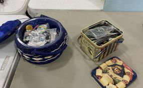 Decorative Tin and Decorative Oval Basket of Sewing Supplies and Material
