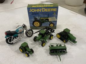 Group of Model John Deere Tractors, 1 Attachment, Motorcycle and 2004 Tractor-A-Day Calendar In Box.