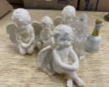 Four Ceramic Cherubs, Glass Angel, and Bell