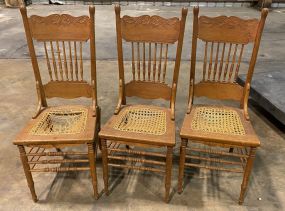 Three Oak Pressed Back Dining Chairs