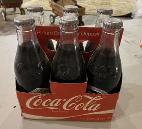 Six Pack of Coca Cola Bottles