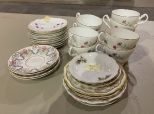 Group of Porcelain Demitasse Cups and Saucers