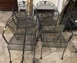 Four Wrought Iron Patio Chairs