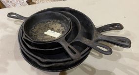 Group of Old Cast Iron Skillets