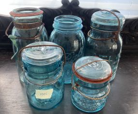 Five Light Blue Atlas and Ball Jars