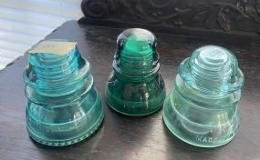 Three Glass Telephone Insulators