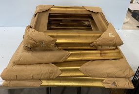 Four Assorted Sized Gold Gilt Wood Frames