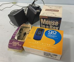 Computer Mouse, Samsung Go, Wireless Charger, and Speakers