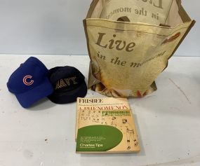 Group of Frisbees, Books, and Hats