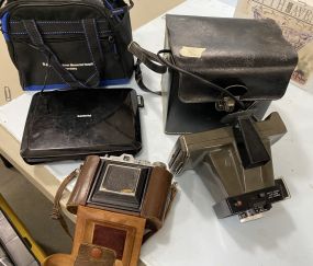 Vintage Cameras and DVD Portable Players