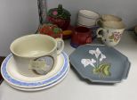 Group of Pottery Plates, Cups, and Mugs